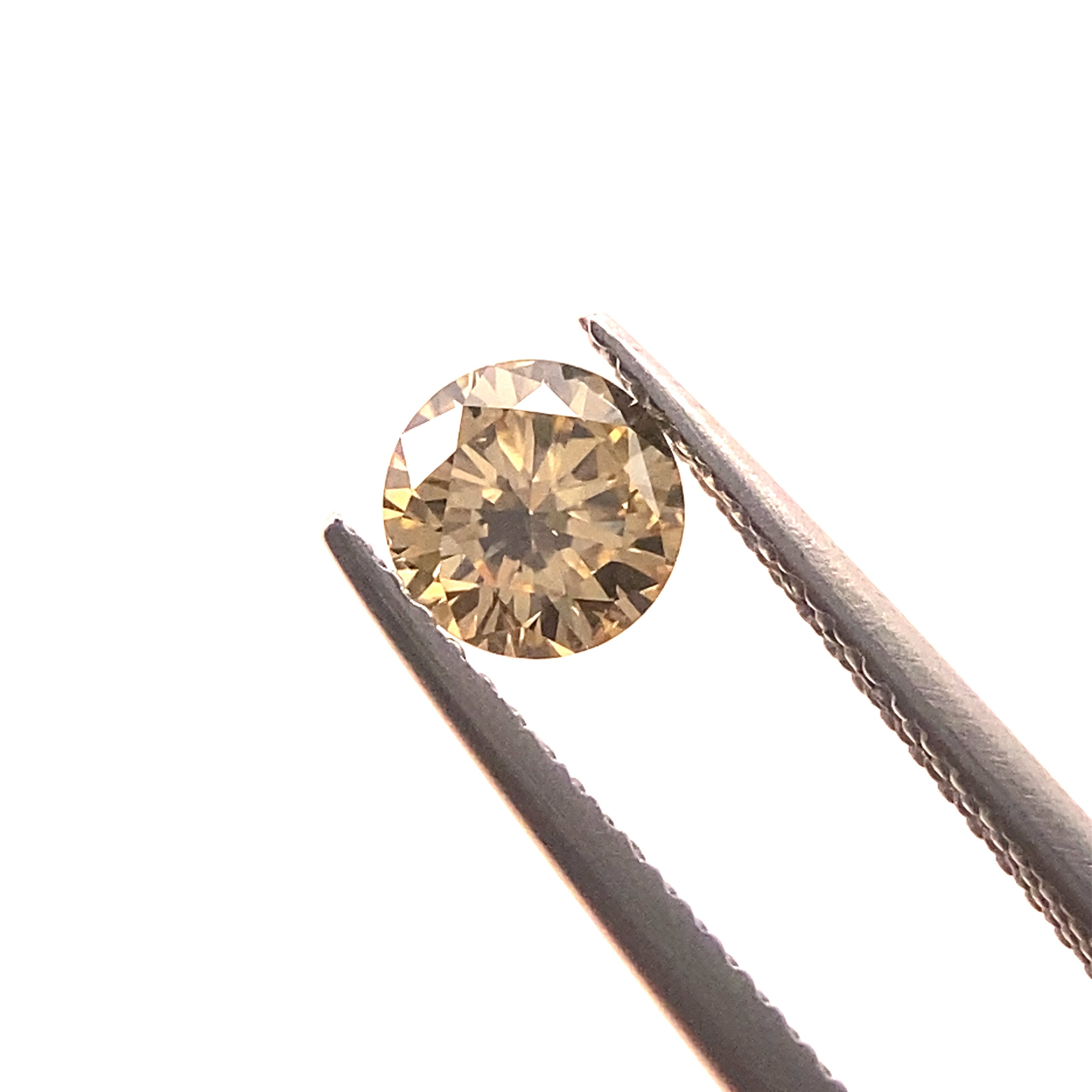 Champagne Diamond Round 0.69ct – Ajanta Afrika