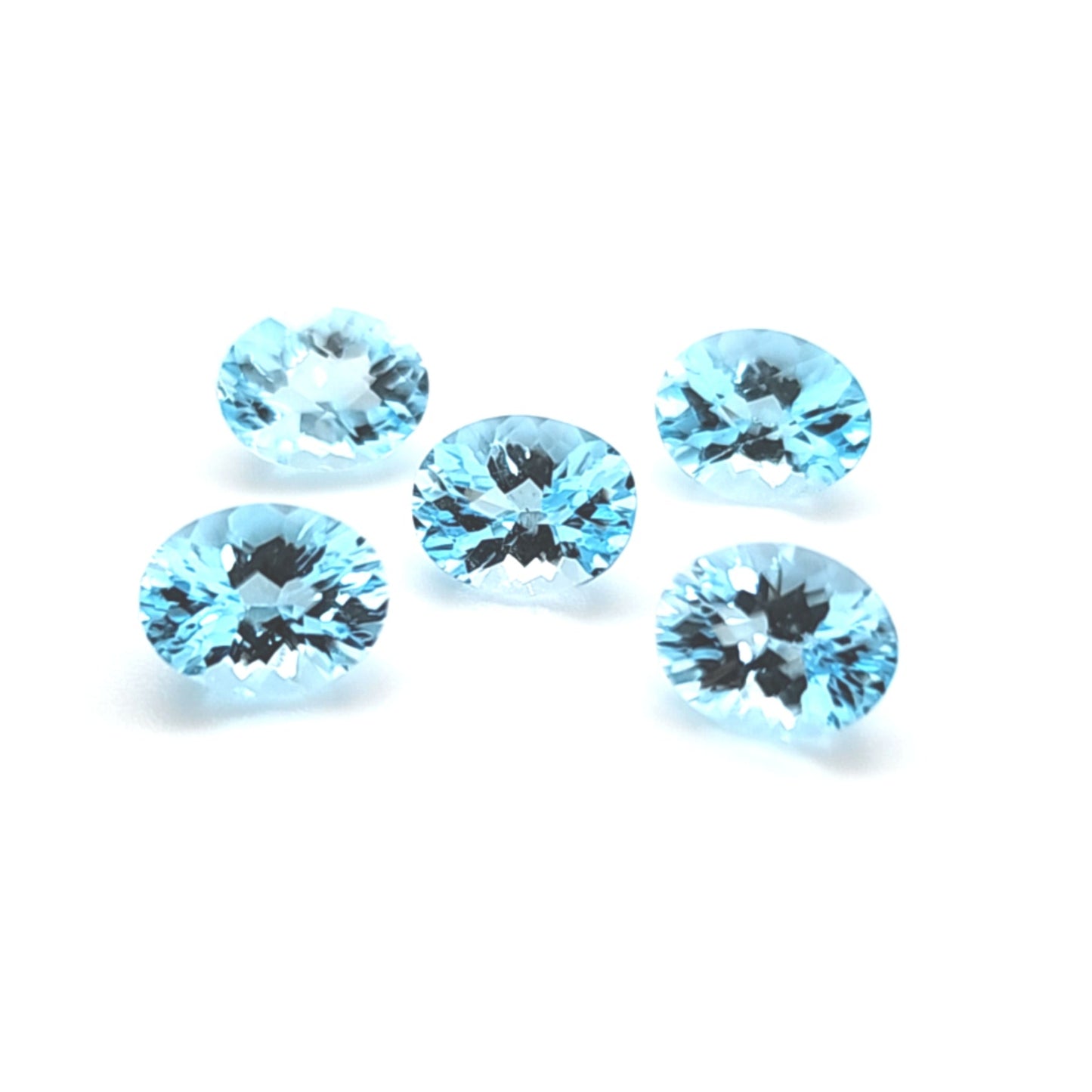 Sky Blue Topaz Oval Concave Price List