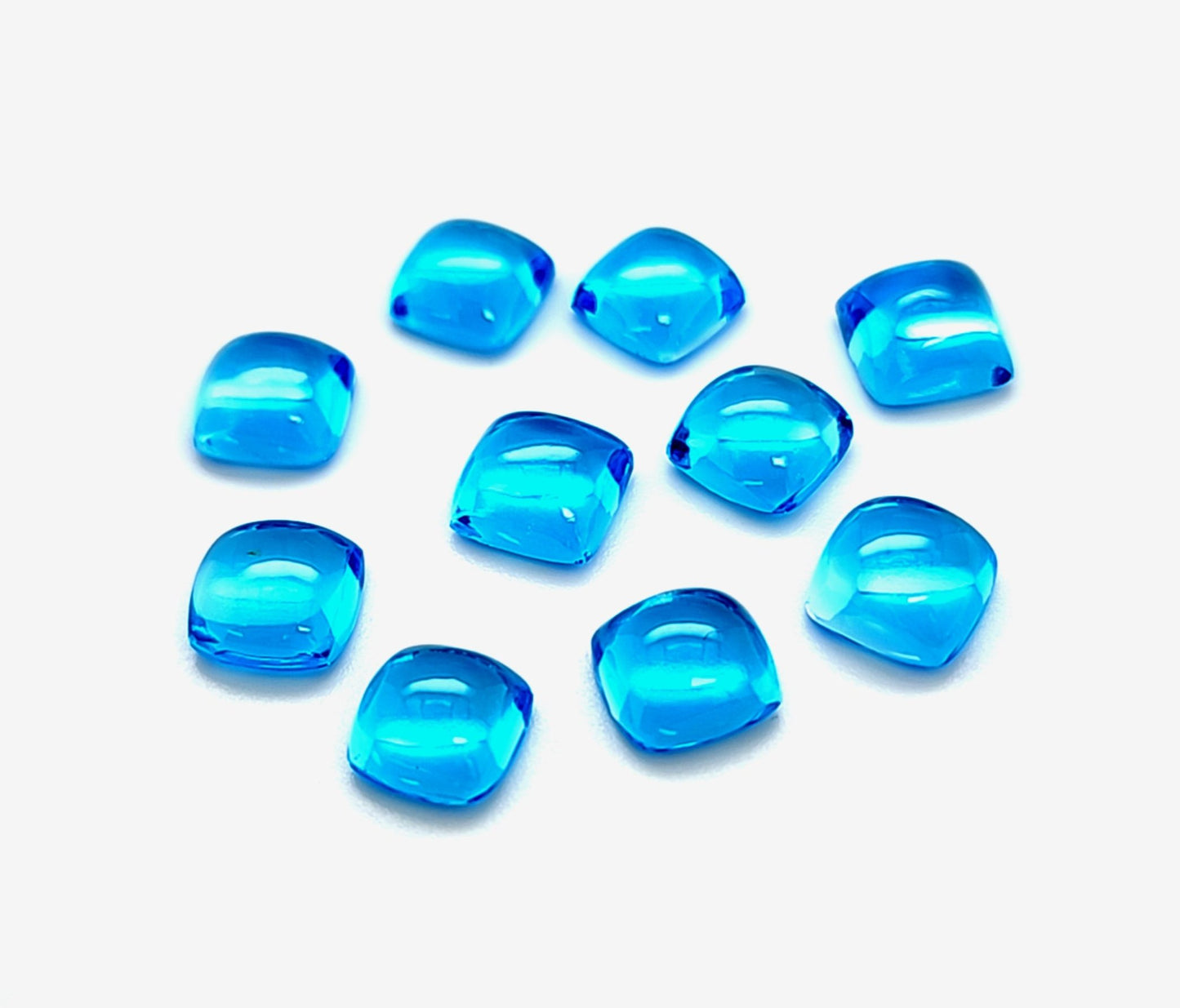 Swiss Blue Topaz Cushion Cab Price List