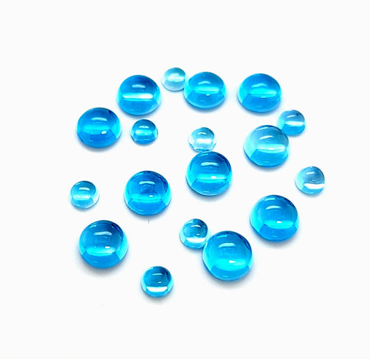 Swiss Blue Topaz Round Cab Price List