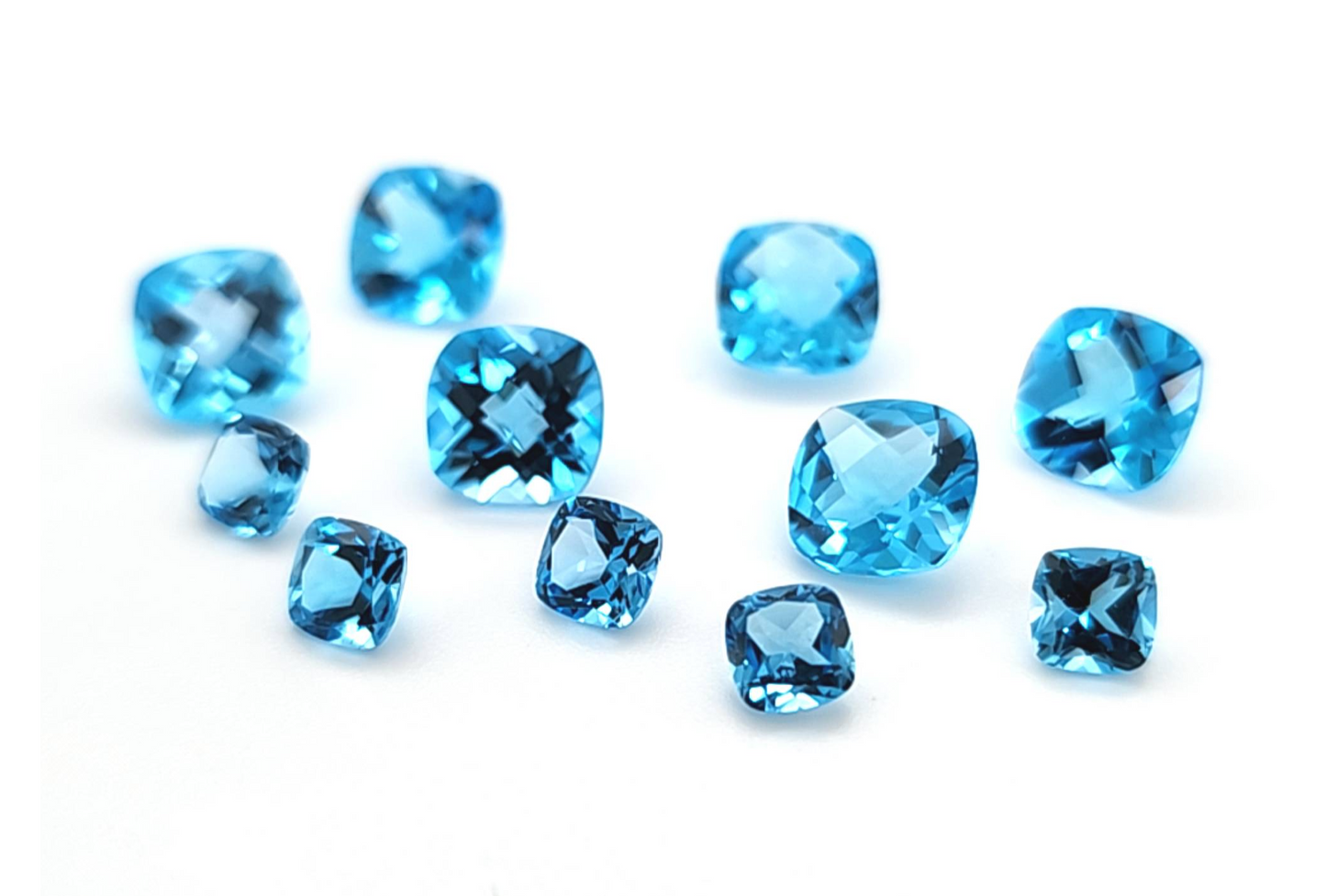 Swiss Blue Topaz Cushions Price List